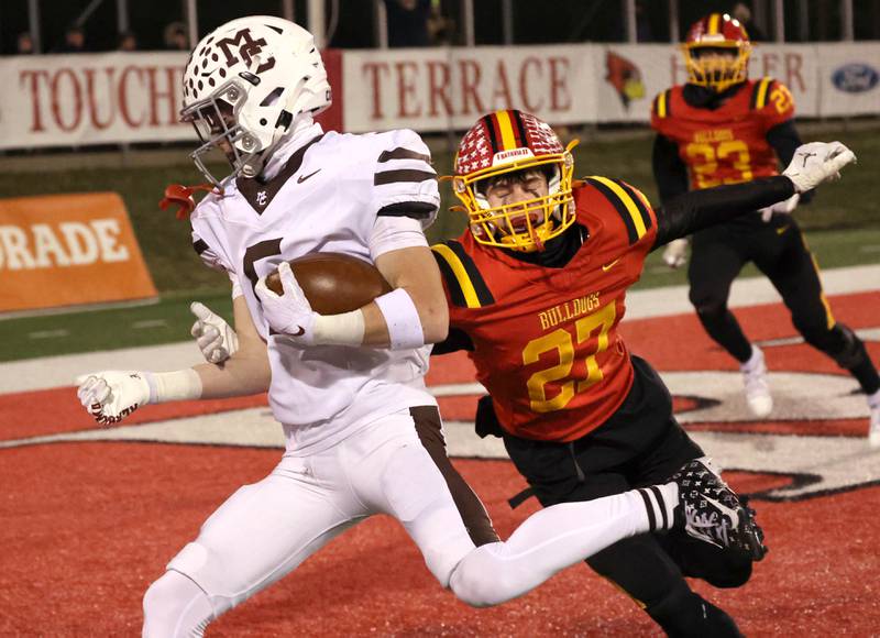 Mt. Carmel's Cooper Lehman scores a touchdown in front of Batavia's Andrew Culotta during their Class 8A state championship game Saturday, Nov. 30, 2024, in Hancock Stadium at Illinois State University in Normal.