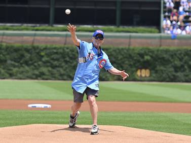 Richmond cancer survivor throws 1st pitch at Father’s Day Cubs game 