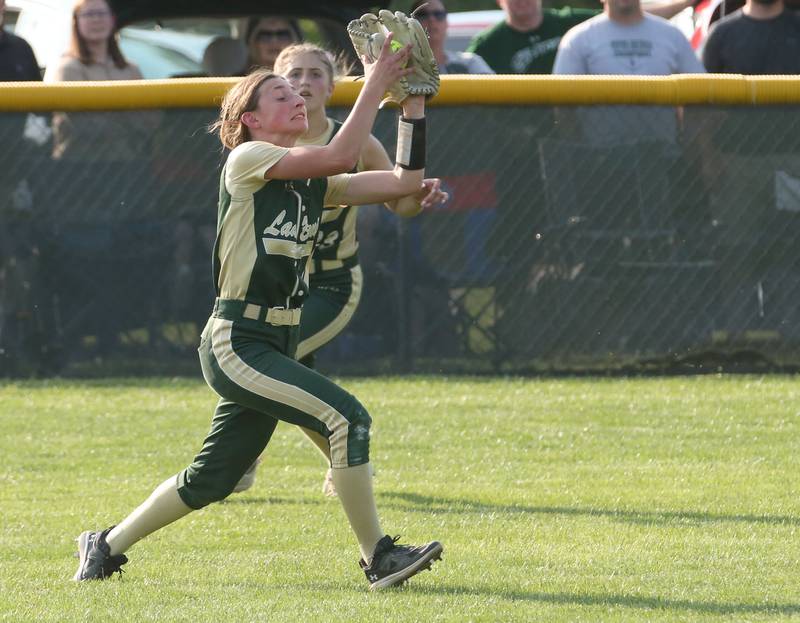 St. Bede left fielder Emma Slingsby makes a catch on the run against Ridgewood Alwood/Cambridge in the Class 1A Sectional semifinal game on Tuesday, May 23, 20223 at St. Bede Academy.