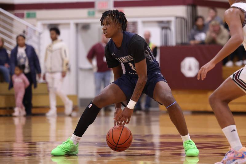 Plainfield South’s Amarri Ford works the ball against Lockport on Wednesday January 25th, 2023.