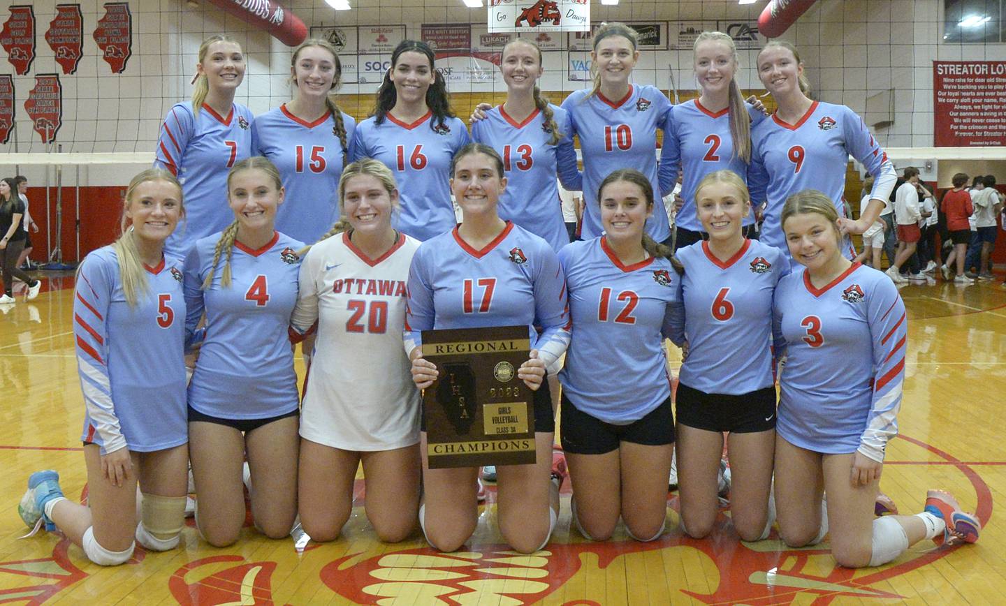 The Ottawa Lady Pirates with their 2023 Regional Volleyball Championship plaque.