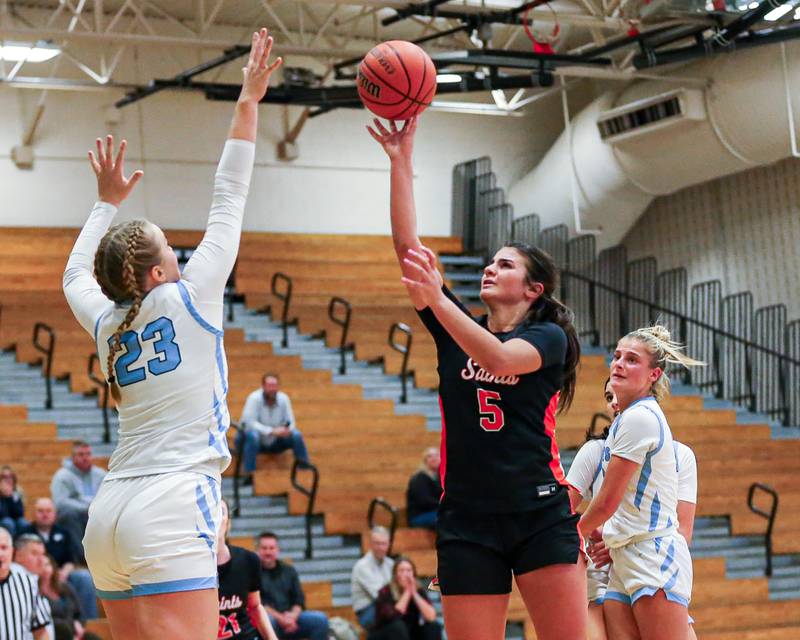 St Charles East's Lexi DiOrio (5) puts up a shot at the York Thanksgiving Tournament. Nov 13, 2023.