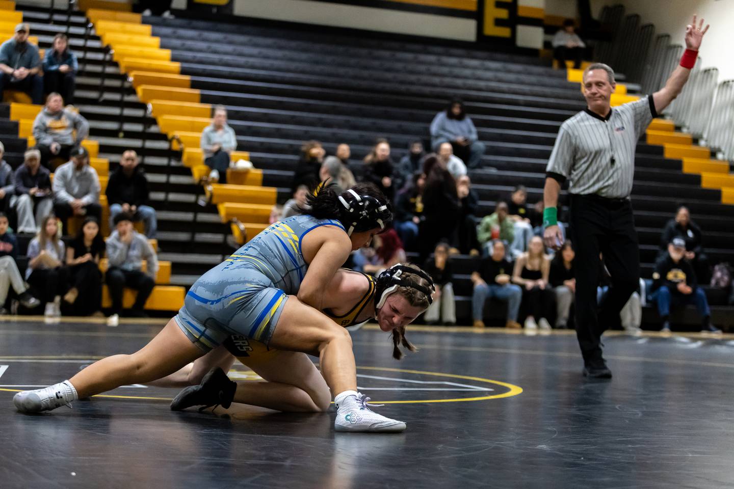 Joliet Central’s Izabel Barrera and Joliet West’s Elayna Spoljaric compete in the 130 pound match at Joliet West on Jan. 12, 2026.