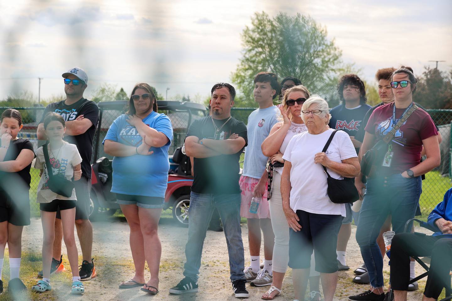 Family and friends of the late coach Deb "Coach J" Johnston attend a pregame ceremony dedicating the Deb Johnston Memorial Softball Field at Kankakee High School on Wednesday, May 7, 2025.