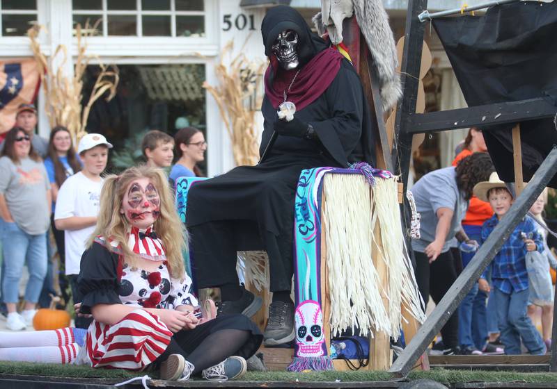 Characters from the Nightmare on Fairgrounds Road Haunted Attraction ride a float in the 6th annual Halloween parade on Saturday, Oct. 12, 2024 downtown Princeton.