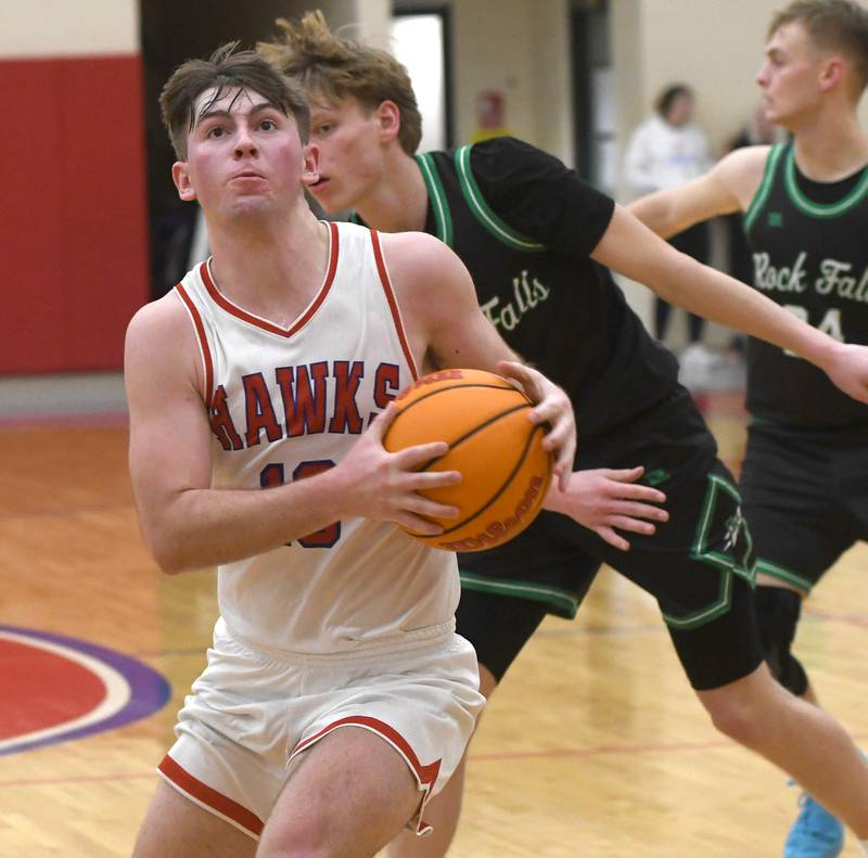 Oregon's Keaton Salsbury (10) drives to the basket against Rock Falls on Friday, Jan. 9, 2026 at the Blackhawk Center in Oregon.
