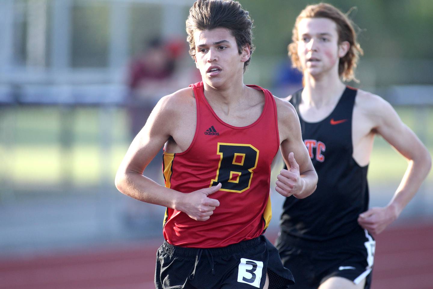 Batavia’s Quintin Lowe runs the 3200-meters during the Class 3A St. Charles North Sectional on Thursday, May 19, 2022.