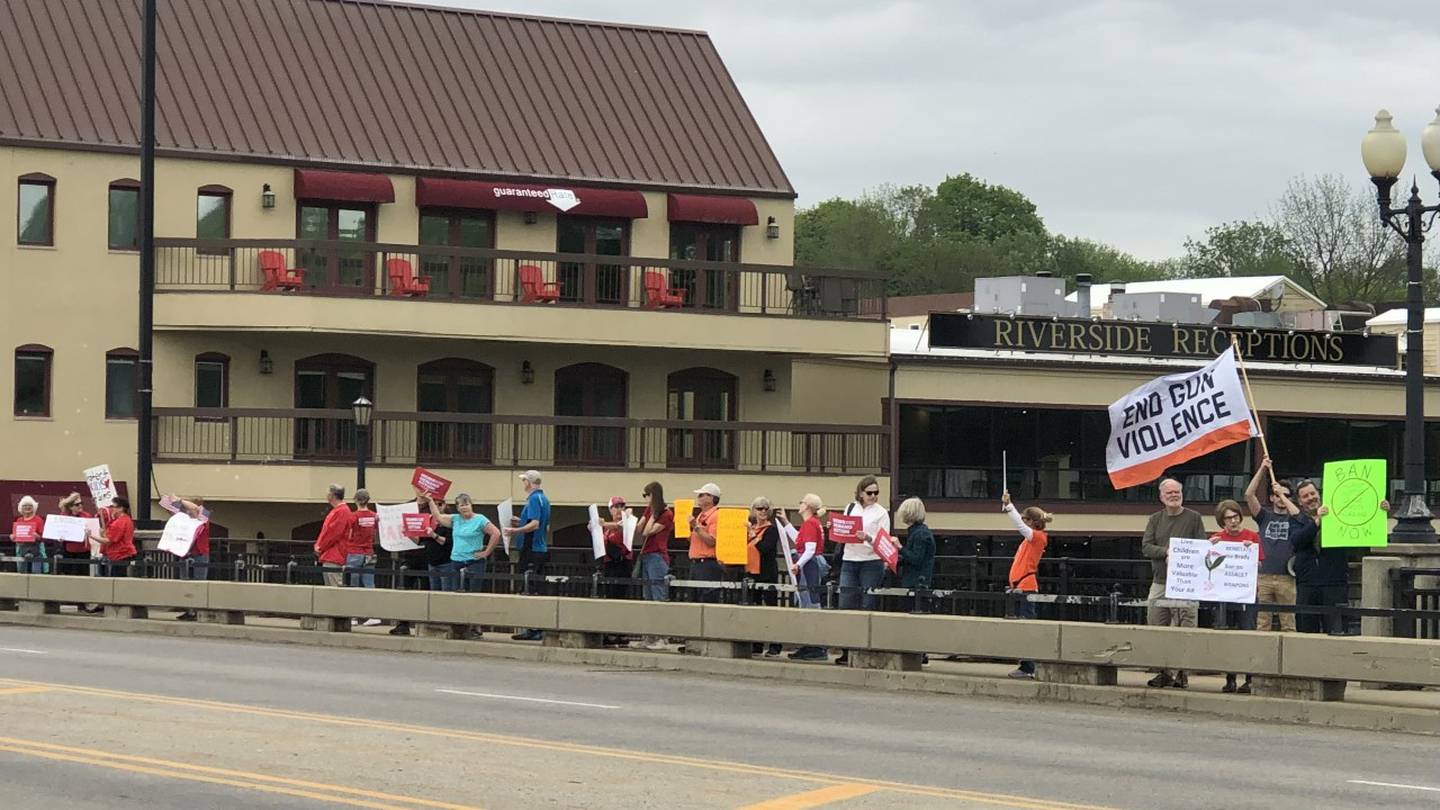 Protesters occupying the Route 38 bridge over the Fox River in Geneva Saturday May 13, 2023, to protest gun violence and call for legislative reform.