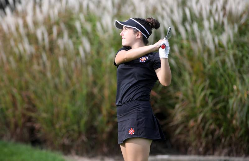St. Charles East’s Manuela Ramirez tees off during the 2023 Class 2A Glenbard North Regional girls golf meet at Bloomingdale Golf Club.