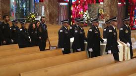 Funeral services are held for a Chicago police officer fatally shot while heading home from work