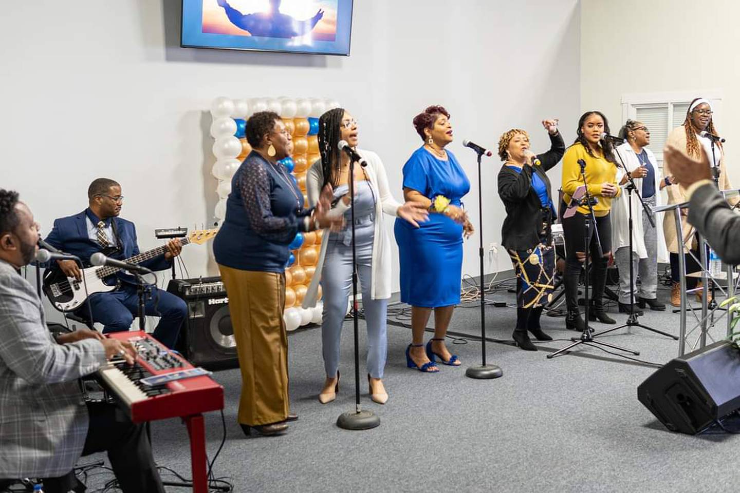 Members of The Way Church of Joliet celebrate its eighth anniversary in April 2022 in its new space on Theodore Street in Joliet.