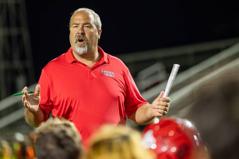 Head Coach, Nick Sterling talks to team after loss on Friday, Sept 5, 2025 at Richard Nesti Stadium in Spring Valley.