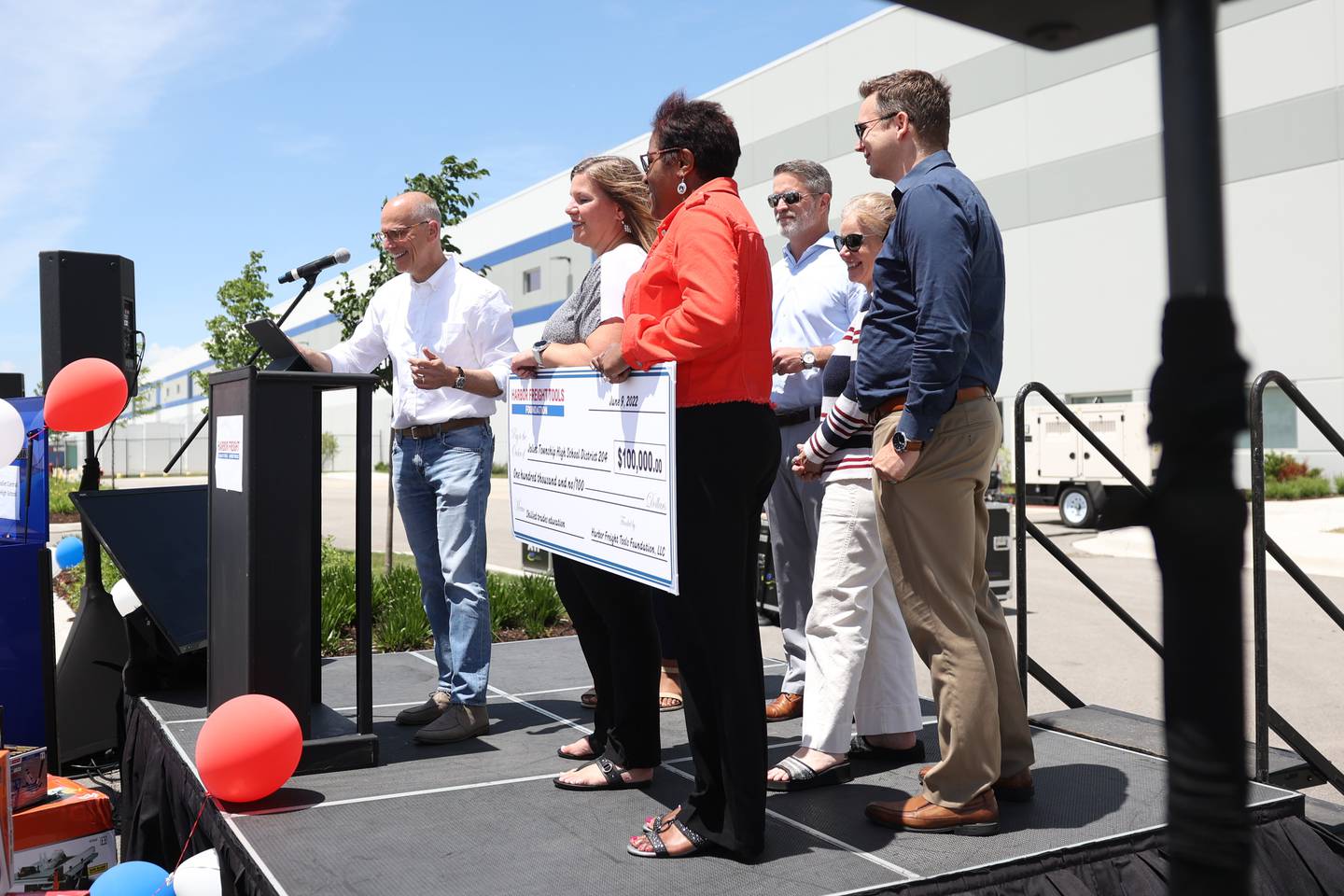 Harbor Freight President Allan Mutchnik presents a check for $100,000 to the Joliet Township School District 204. Harbor Freight opened a new 1.6 million square-foot distribution center in Joliet that is expected to bring 800 new jobs to the area. Thursday, June 9, 2022 in Joliet.Harbor Freight opened a new 1.6 million square-foot distribution center in Joliet that is expected to bring 800 new jobs to the area. Thursday, June 9, 2022 in Joliet.