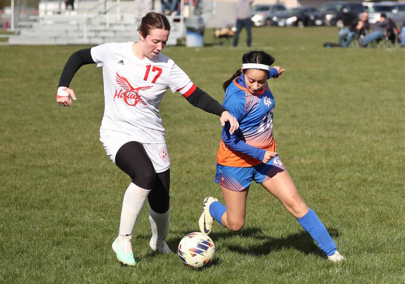 Oregon's Teagan Champley (left) and Genoa-Kingston's Paulina Lara chase fight for possession during their game Friday, April 5, 2024, at Genoa-Kingston High School.