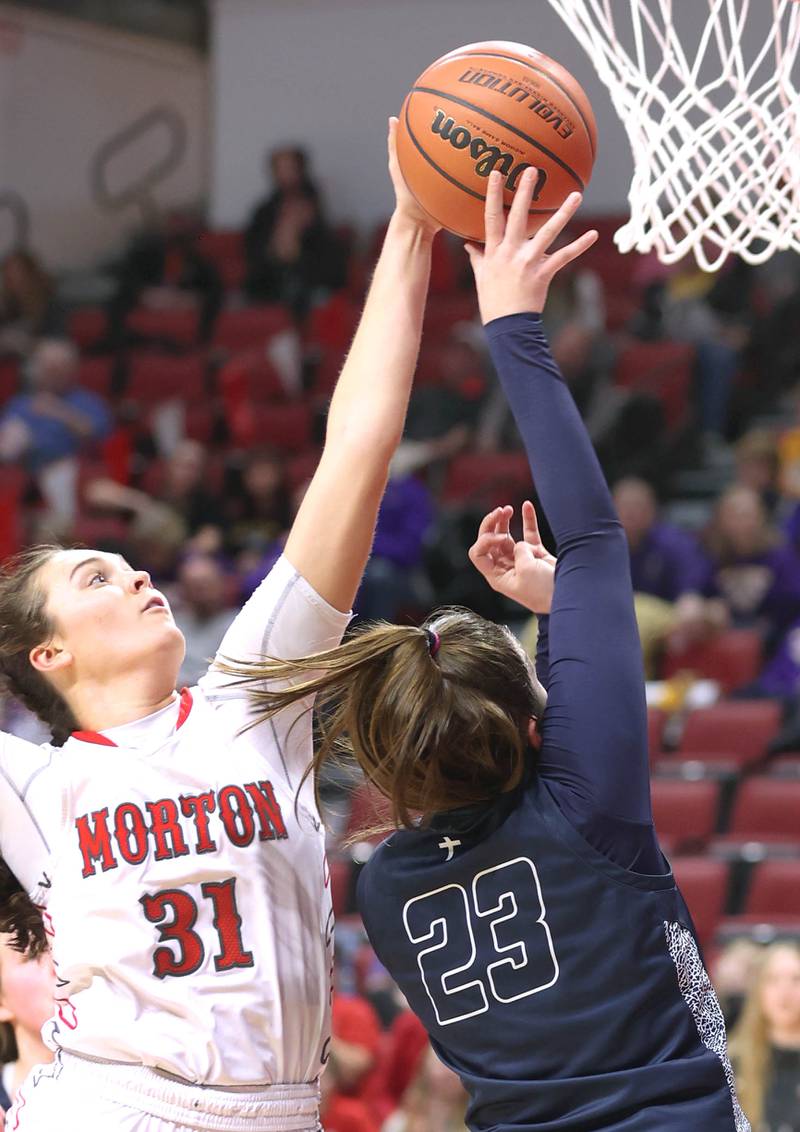 Morton's Katie Krupa blocks the shot of Nazareth's Danielle Scully during their Class 3A state semifinal game Friday, March 4, 2022, in Redbird Arena at Illinois State University in Normal.