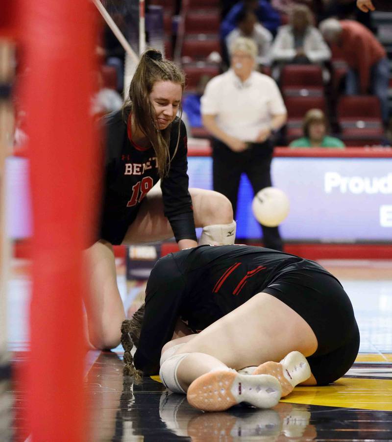 Benet’s Gabija Staniskis (18) and Benet’s Annie Eschenbach (17) react after losing during the IHSA Class 4A girls volleyball state title game between Benet Academy and Mother McAuley Saturday November 12, 2022 at Redbird Arena in Normal.