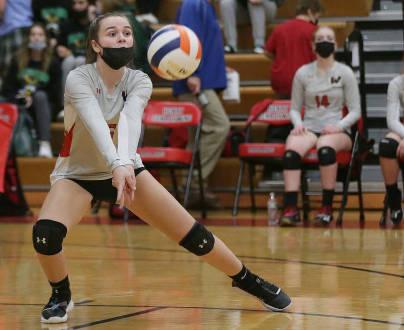 Woodland's Clara Downey returns a serve from Yorkville Christian during a Class 1A regional semifinal in Henry on Wednesday, Oct. 27, 2021.