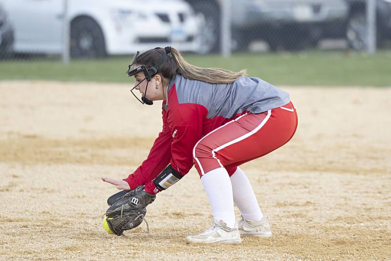 Oregon’s Gracen Pitts scoops the ball at second for an out Wednesday, April 5, 2023 against Dixon.