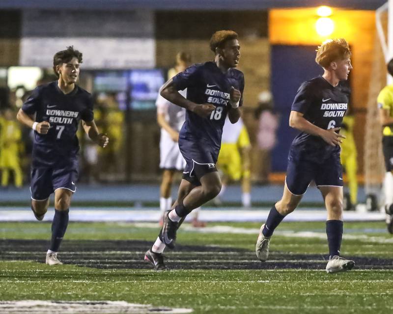 Downers Grove South's Zeke Hall-Taylor (18) runs back in position with his teammates after kicking a goal during soccer match between Downers Grove North at Downers Grove South. Oct 2, 2025.