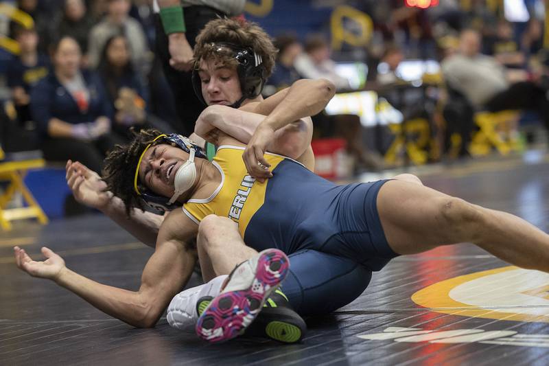 Sterling’s Tatum Allen and Geneseo’s Grady Hull face off in a 157 pound match Friday, Jan. 31, 2025, during the Western Big 6 conference wrestling tournament held at Sterling High School.