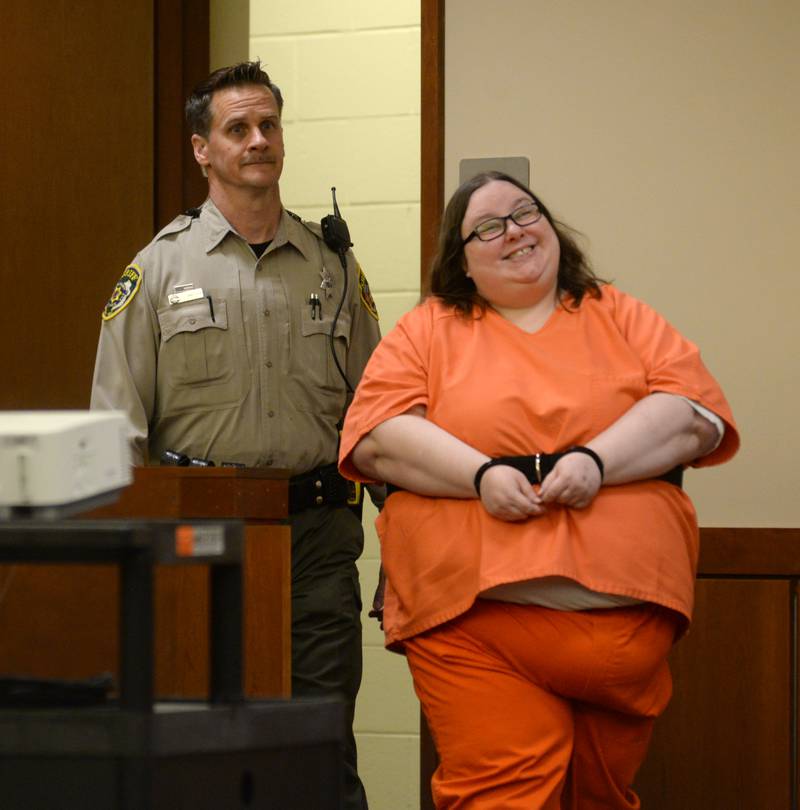 Sarah Safranek is escorted into an Ogle County courtroom in Oregon by deputy Dan Daub on Wednesday, Nov.. 8, 2023.