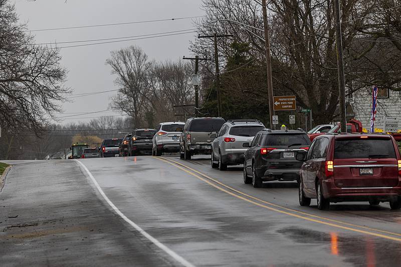 Vehicles line Third Street in Prophetstown Thursday, April 4, 2024 during the funeral procession of Jayden Hanson.