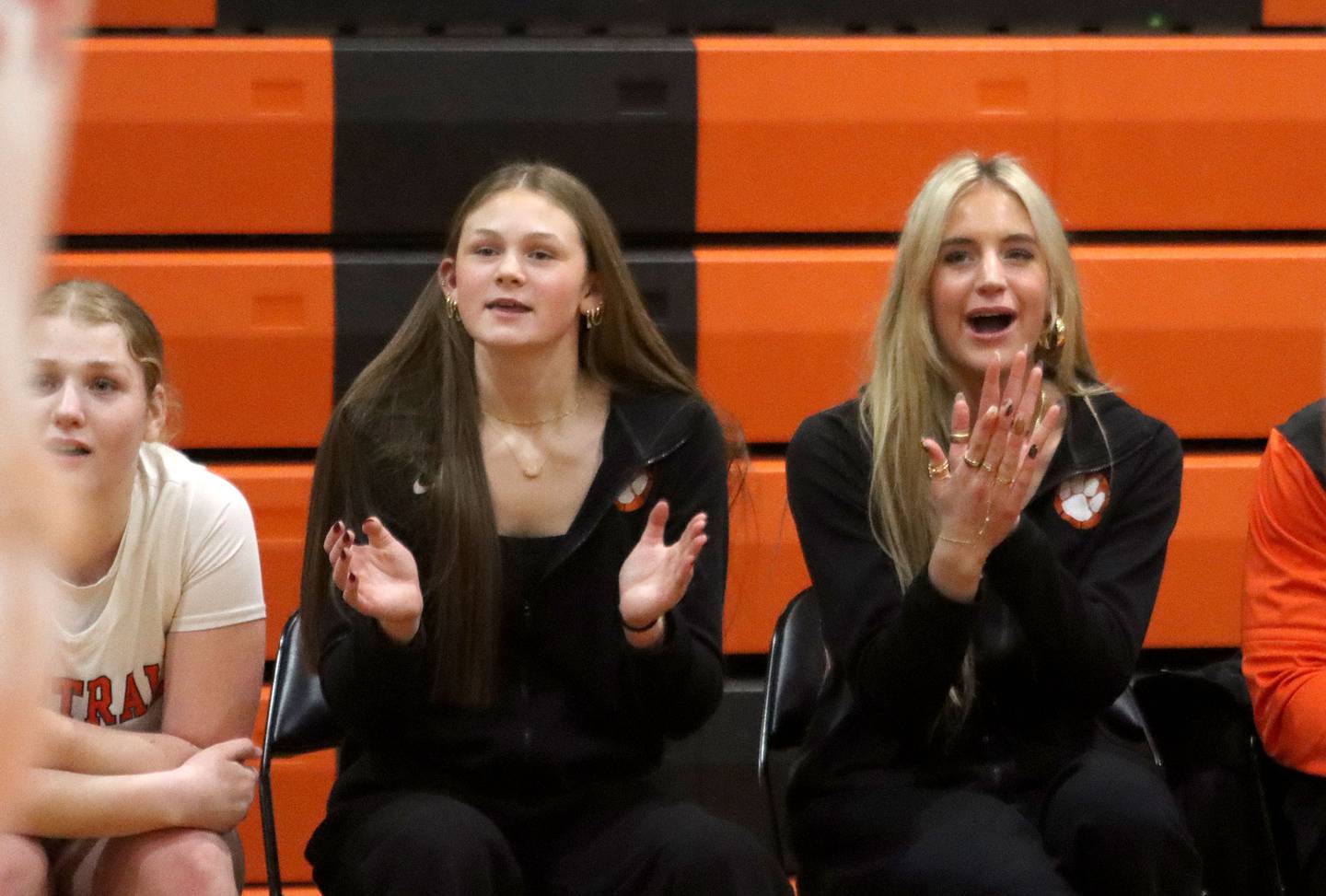 Crystal Lake Central’s Ruby Macke, right, cheers from the bench as the Tigers build a lead against Woodstock North in varsity girls basketball on Monday, Jan. 26, 2026, at Crystal Lake Central High School in Crystal Lake.