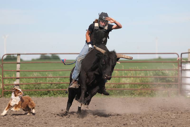 Dominic Dubberstine-Ellerbrock rides a bull during practice at the Rugged Cross Cattle Company. Dominic will be competing in the 2022 National High School Finals Rodeo Bull Riding event on July 17th through the 23rd in Wyoming. Thursday, June 30, 2022 in Grand Ridge.