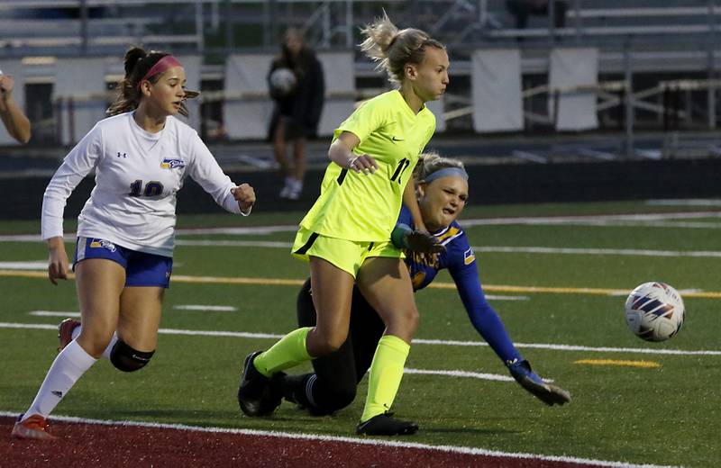 Johnsburg's Sophie Person tries to get the ball as Johnsburg's Aliyah Andersen races to the ball in front of Johnsburg's London Baidinger during Kishwaukee River Conference Girls Soccer  Tournament Championship Match Wednesday, May 3, 2023, at Richmond-Burton High School.
