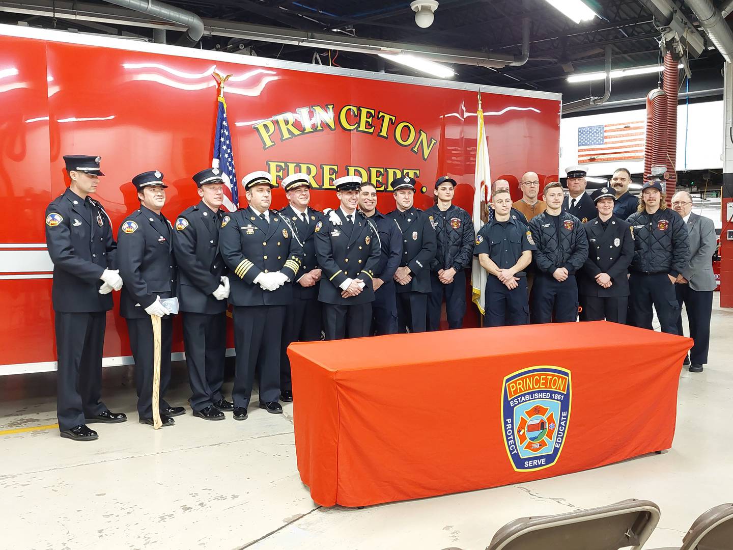 Members of the Princeton Fire Department pose for a photo Monday, Feb. 5, 2024, following the swearing in of Lt. Eli VanAutreve.