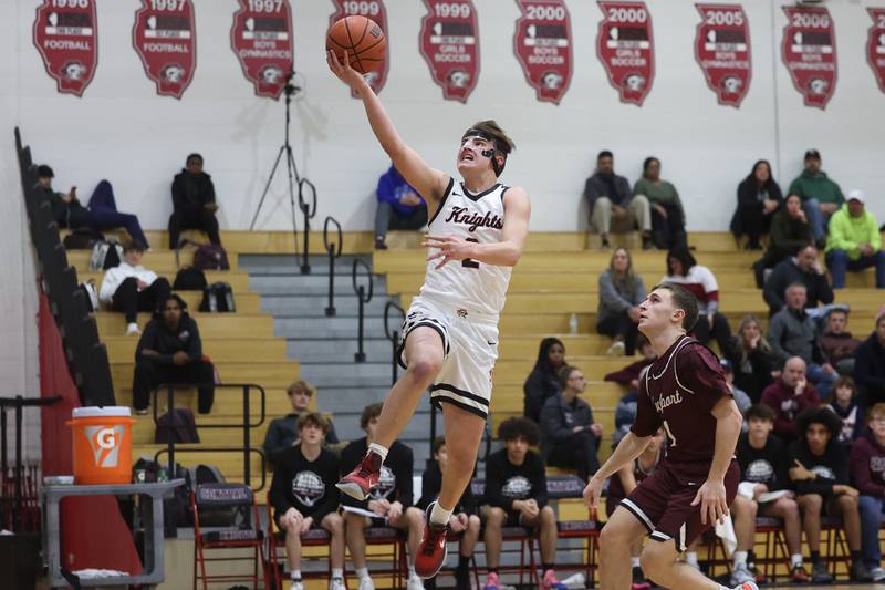 Lincoln-Way Central’s Will Gehrke lays in a shot against Lockport on Tuesday, Jan. 23rd, 2024 in New Lenox.