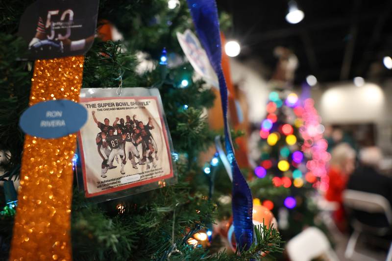 A tree is decorated with 1985 Chicago Bears Super Bowl history, created by the Women of the Moose, at the Kankakee County Museum during the 47th annual Gallery of Trees kickoff event on Wednesday, Dec. 3, 2025. This year's theme is "Blast from the Past."