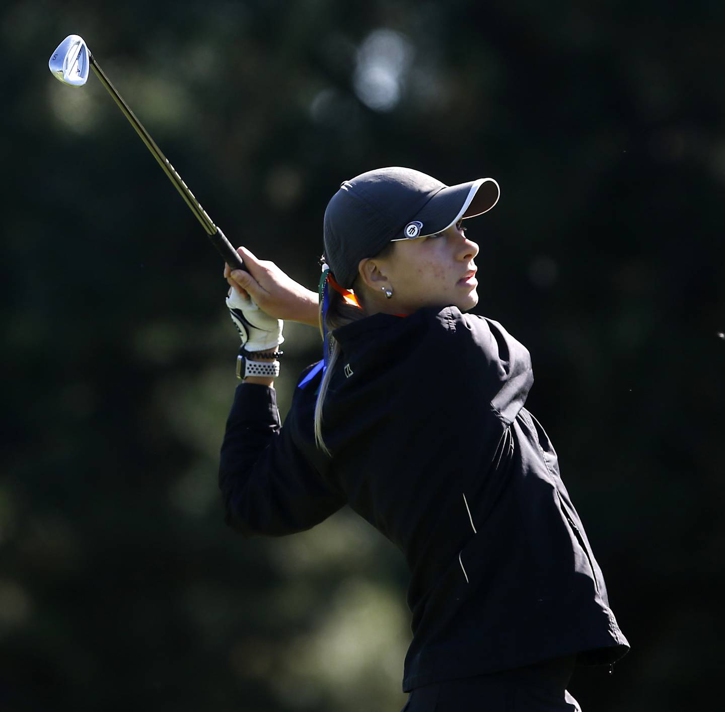 Crystal Lake Co-op’s Madeline Trannell watches her tee shot the eight hole during the IHSA Class 2A Huntley Girls Golf Regional on Tuesday, Oct. 1, 2024, at Pinecrest Golf Club in Huntley.
