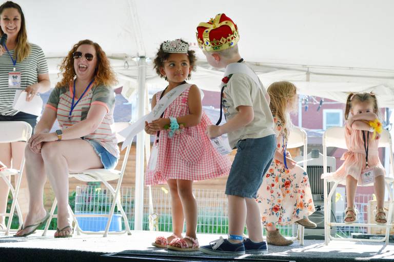 Polo Town & Country Days 2022 Little Miss A'Myia Miller and Little Mister Carter Miller, both 4, and unrelated, smile at each other after being crowned on June 16, 2022. There were eight female contestants and seven males.