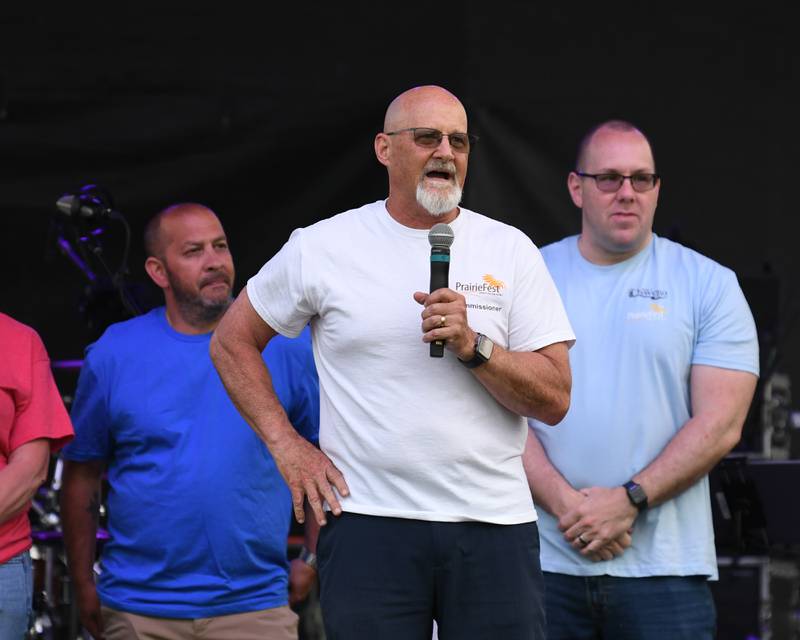Oswegoland Park Board President Dave Behrnes welcomes everyone to opening night of PrairieFest on Thursday June 12, 2025, held at PrairieFest Park in Oswego.
