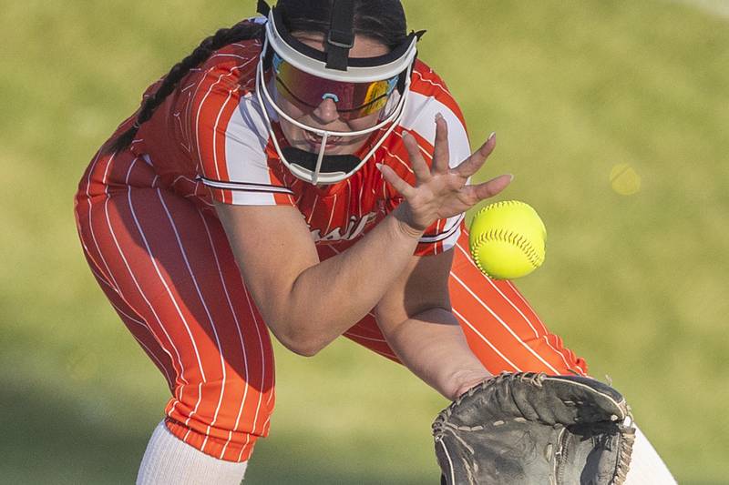 Milledgeville’s Brinley Hackbarth is eaten up for a ball that took a bad bounce against Dakota Tuesday, May 26, 2026, at the Eastland Class 1A softball sectional quarterfinal.