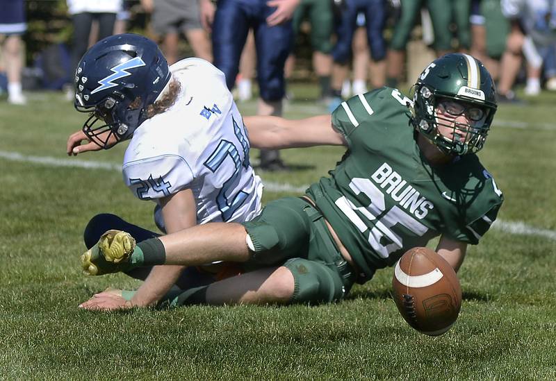 St Bede’s Landon Jackson looks at the ball after causing a fumble Saturday, Oct. 1, 2022 in Peru. St. Bede's Callan Hueneburg scooped it up and ran it for a touchdown.