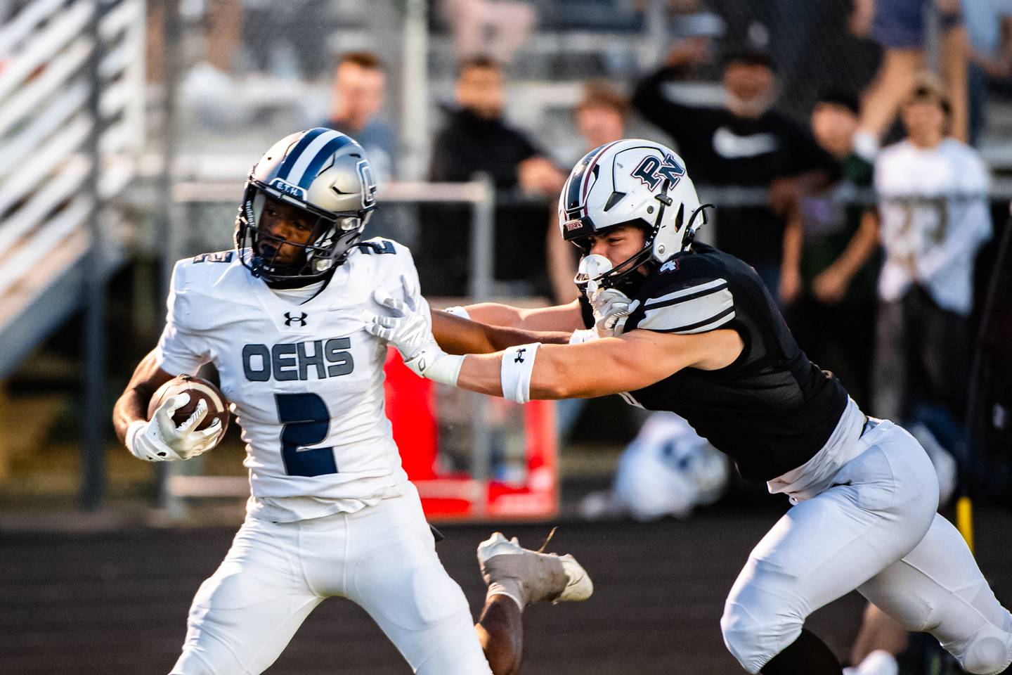 Oswego East's Brandon Solis runs in a touchdown during a game against Plainfield North on Friday Sept. 12, 2025 at Plainfield North High School in Plainfield