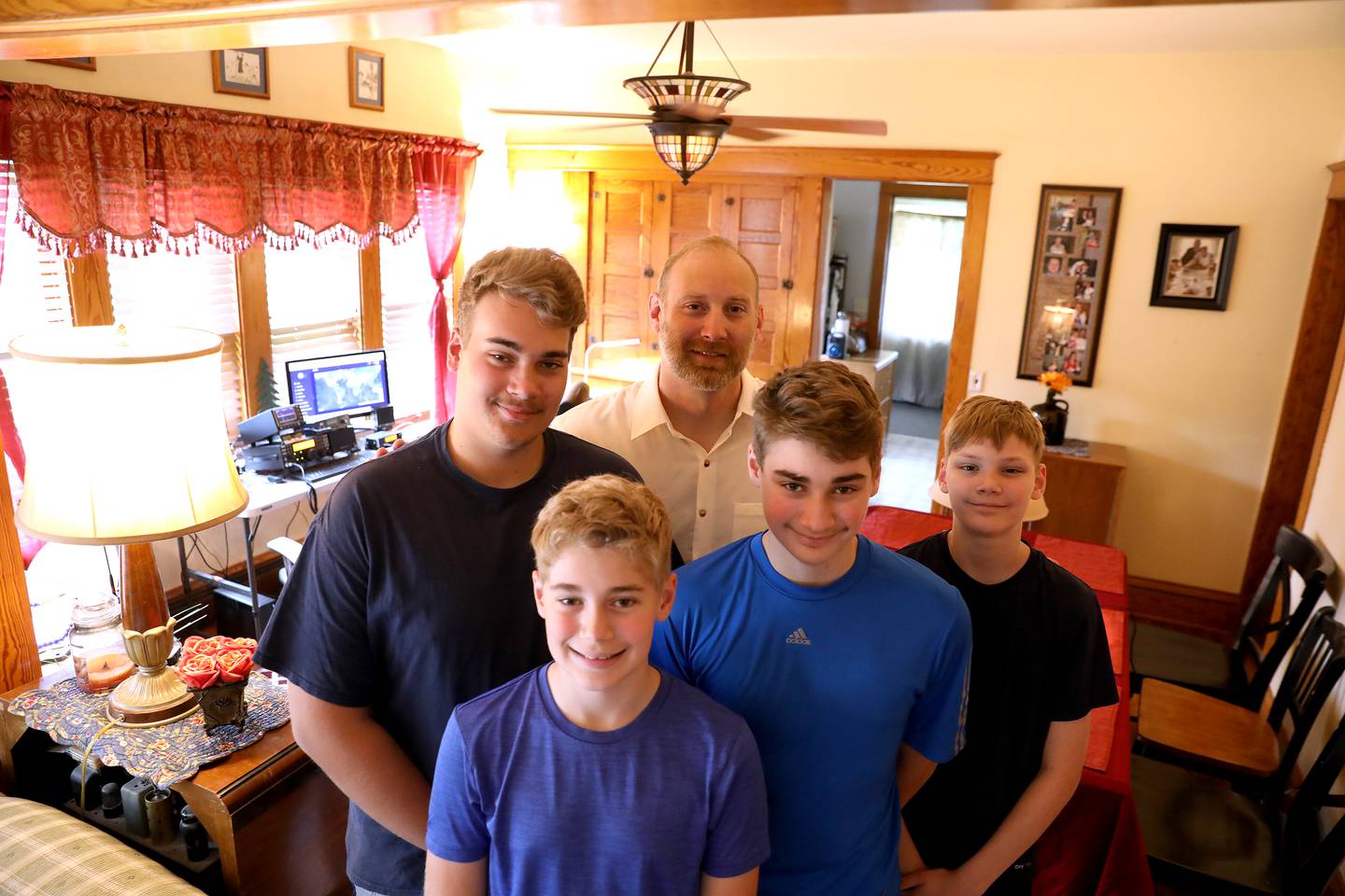 Dan Zielinski (back) of Kaneville and his sons (clocwise from bottom) Thatcher, 11, Ben, 16, Sawyer, 13, and Gabriel, 14, are all ham radio operators.