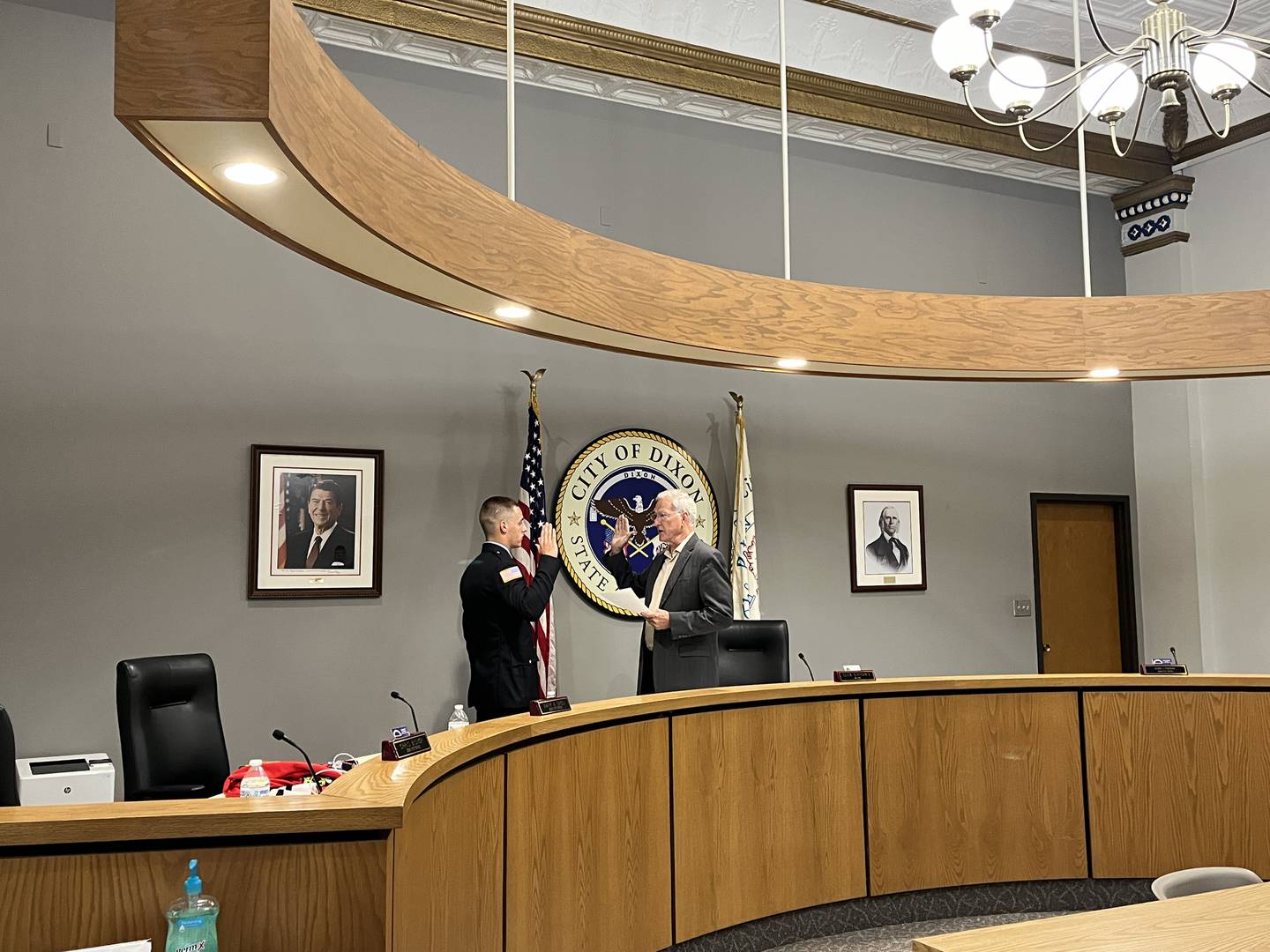 Dixon Mayor Glen Hughes (right) administered the oath of office for firefighter/EMT Jacob Sibley at the Dixon City Council meeting, Monday, May 19, 2025.