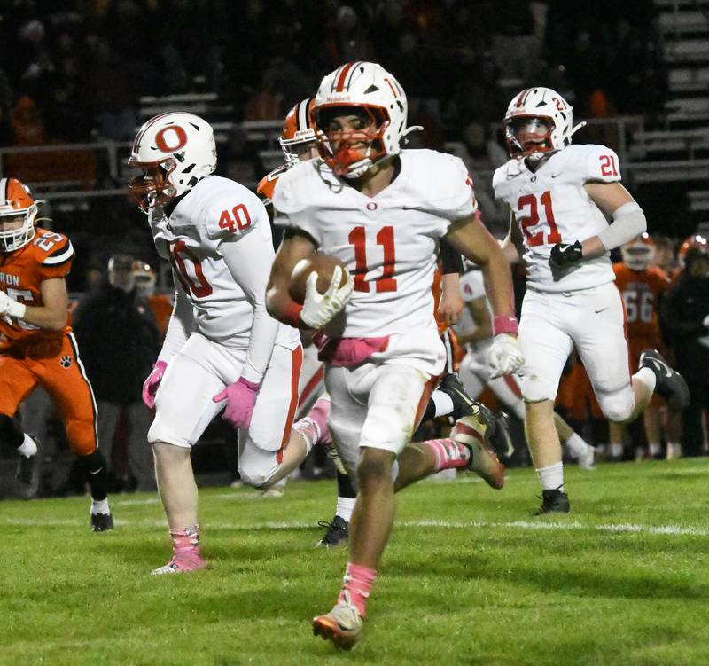 Oregon's Jayden Berry (11) runs with the ball during 3A football playoff action against Byron on Friday, Oct. 31, 2025 at the Everett Stine Stadium in Byron.