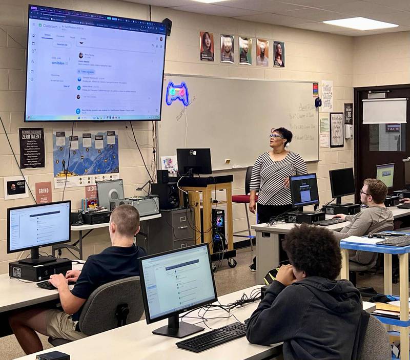 Instructor Mary Worley reviews the day’s lesson plan with students in the Whiteside Area Career Center’s Computer Technology program.