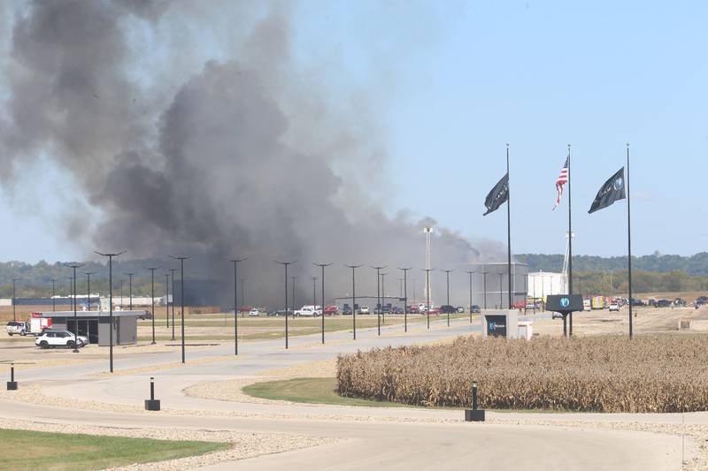 Smoke billows from Marquis Energy as firefighters work to control a structure fire on Wednesday, Oct. 8, 2025 in Hennepin. The fire was upgraded to a 5th alarm dispatching the (MABAS) Mutual Aid Box Alarm System. The fire broke out around 11a.m.