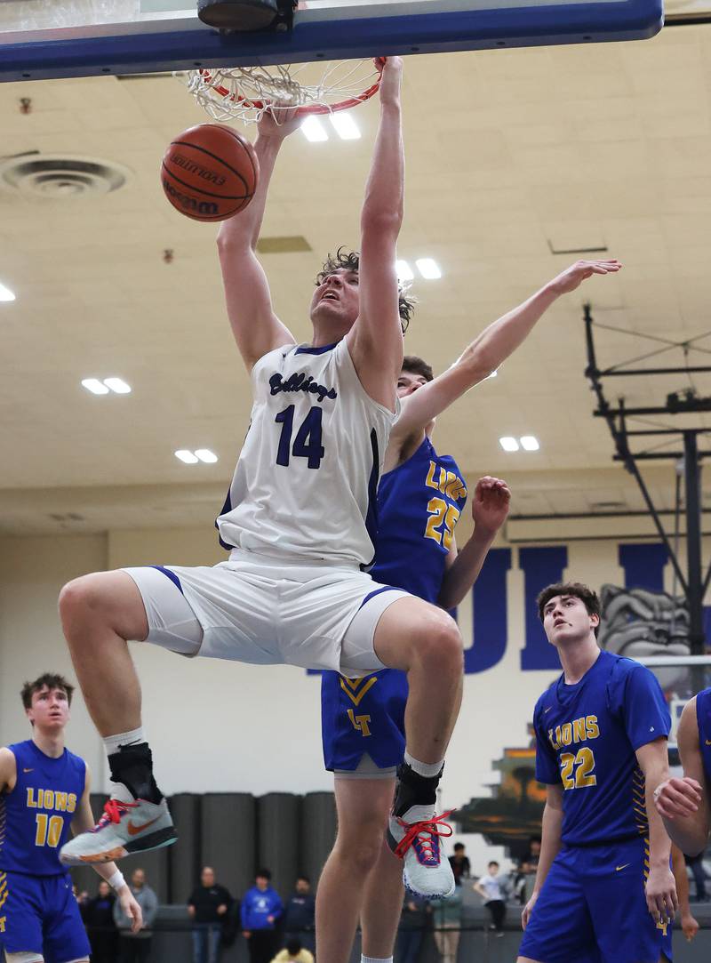Riverside Brookfield’s Stefan Cicic (14) dunks against Lyons during a boys varsity basketball game on Friday, Jan. 26, 2024 in Riverside, IL.