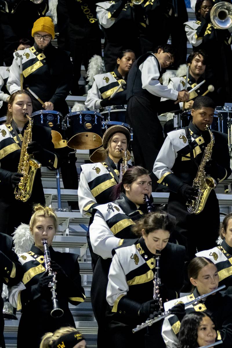 The Joliet West marching band plays during a varsity football game between Joliet West and Joliet Central at Joliet West on Oct. 24, 2025.