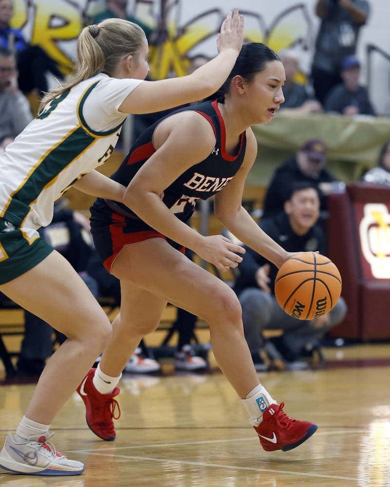 Benet Academy's Emma Briggs (24) moves to the hoop during the Montini girls basketball Christmas tournament Saturday, Dec. 28, 2024 in Lombard.