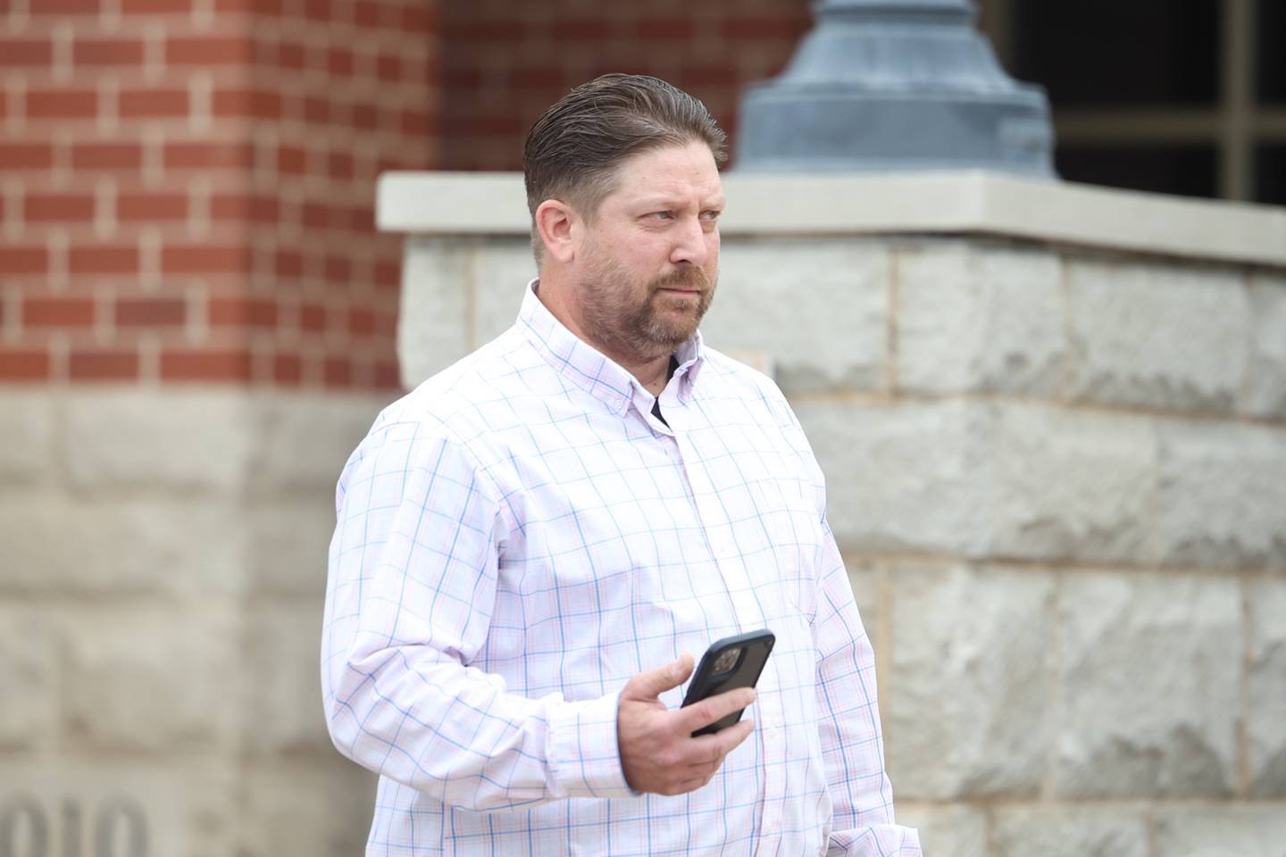 Brian Nagra leaves Kendall County Courthouse on Thursday, Sept. 7, 2023 in Yorkville. The former Joliet Police Officer is motioning to vacate his felony conviction of stealing money from the City of Joliet. Nagra was never fired from the city for the crime.