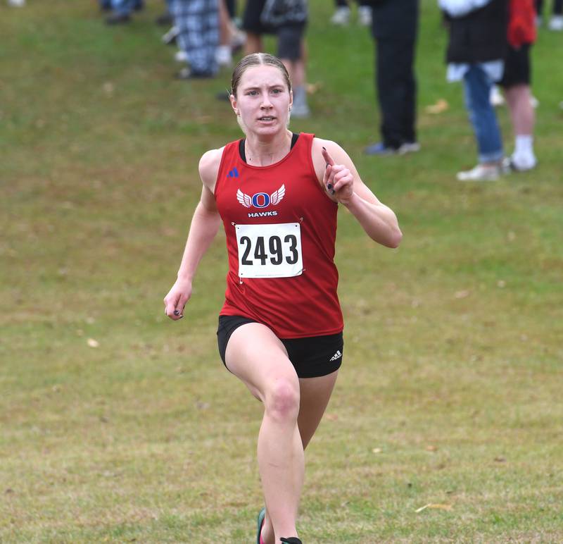 Oregon's Jillian Hammer heads to the finish line at the Amboy Columbus Day Cross Country Invitational held at Shady Oaks Country Club near Amboy on Monday, Oct. 13, 2025.
