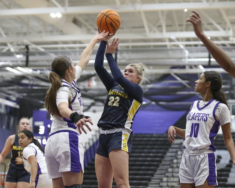 Yorkville Christian's Avery Herron (22) puts up a shot during their basketball game between Yorkville Christian at Plano Wednesday, Jan 07, 2026 in Plano.