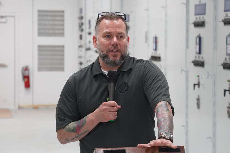 Rochelle City Manager Jeff Fiegenschuh speaks at a 2022 event commemorating a new electrical substation.